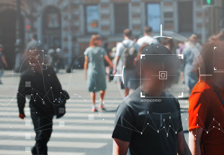 Face recognition and personal identification technologies in street surveillance cameras, law enforcement control. crowd of passers-by with graphic elements. Privacy and personal data protection,