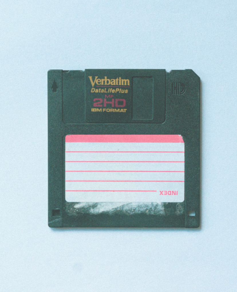 Floppy disk against a light blue background